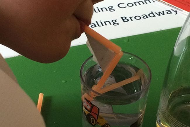 3rd Grade Science My Baba Science student blowing through a crooked straw into a glass of water