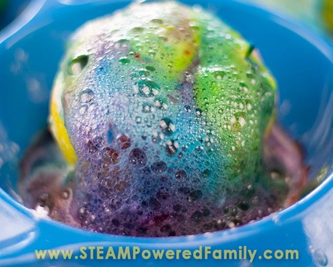 4th Grade Science Steam Powered Family Cut lemon in a blue bowl covered in colorful fizzy foam
