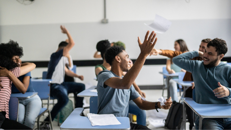 Students playing the unfair game in class